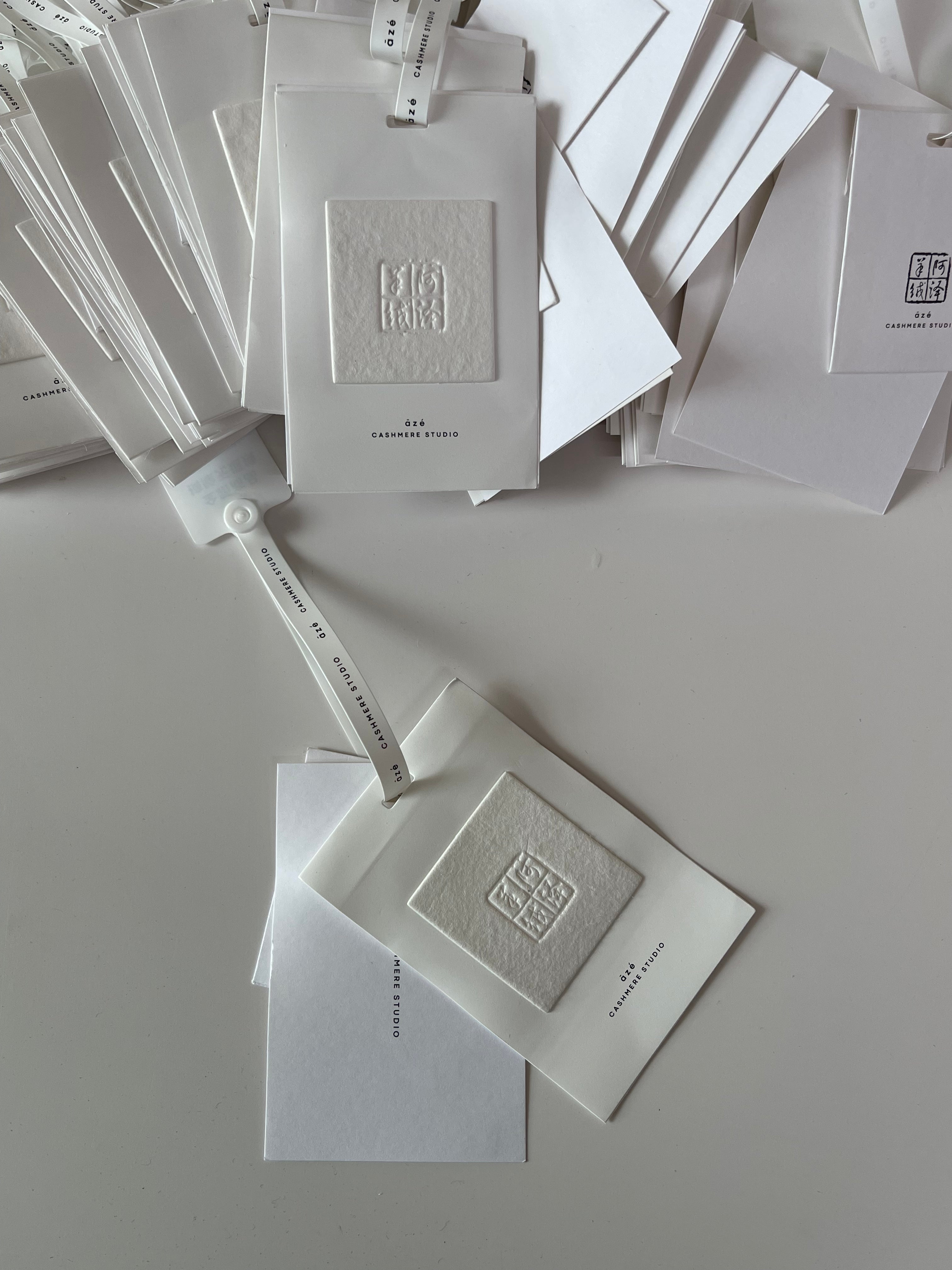 Dape Custom Clothing Hang Tags with Embossed Logo