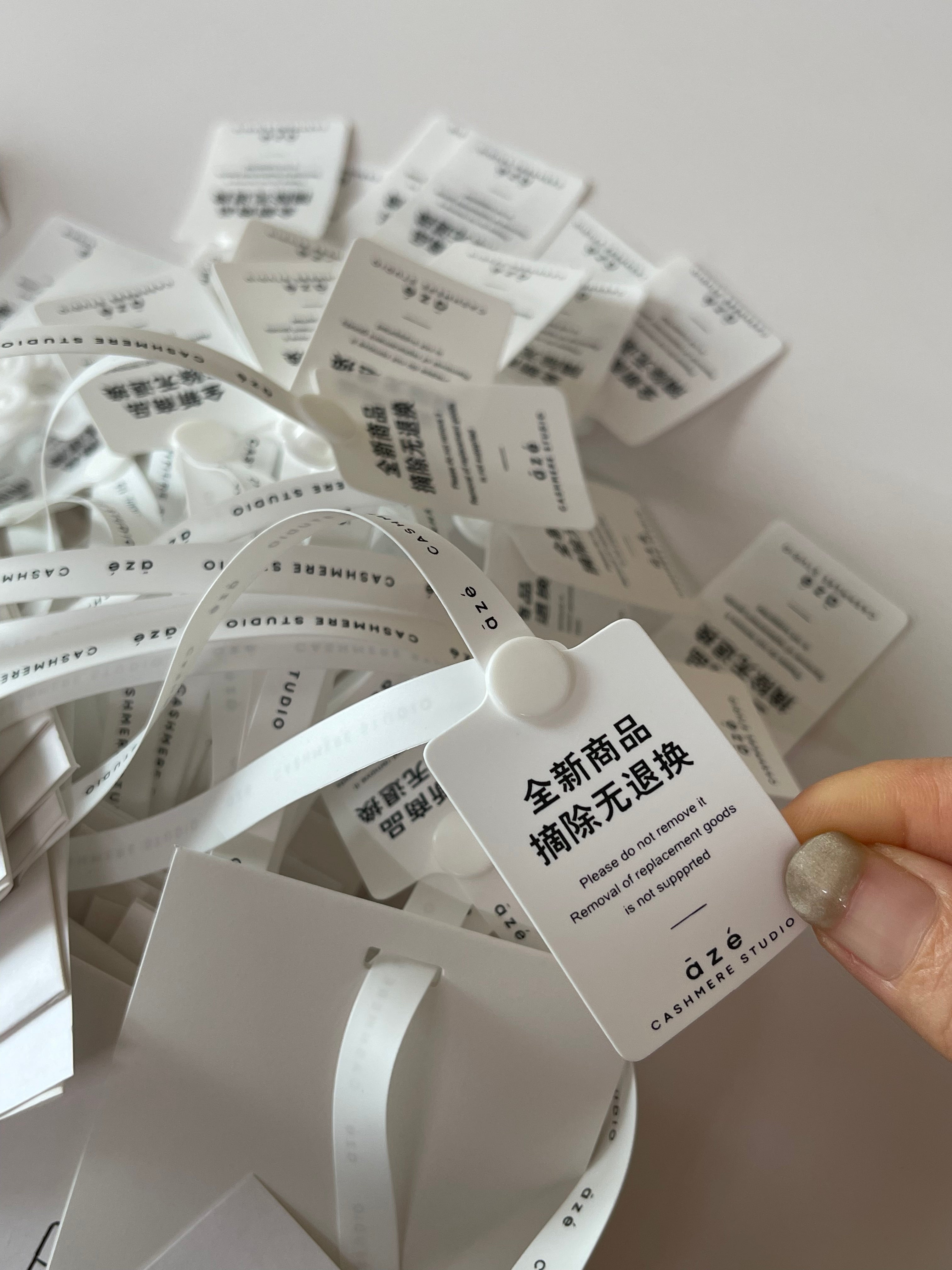 Dape Custom Clothing Hang Tags with Embossed Logo
