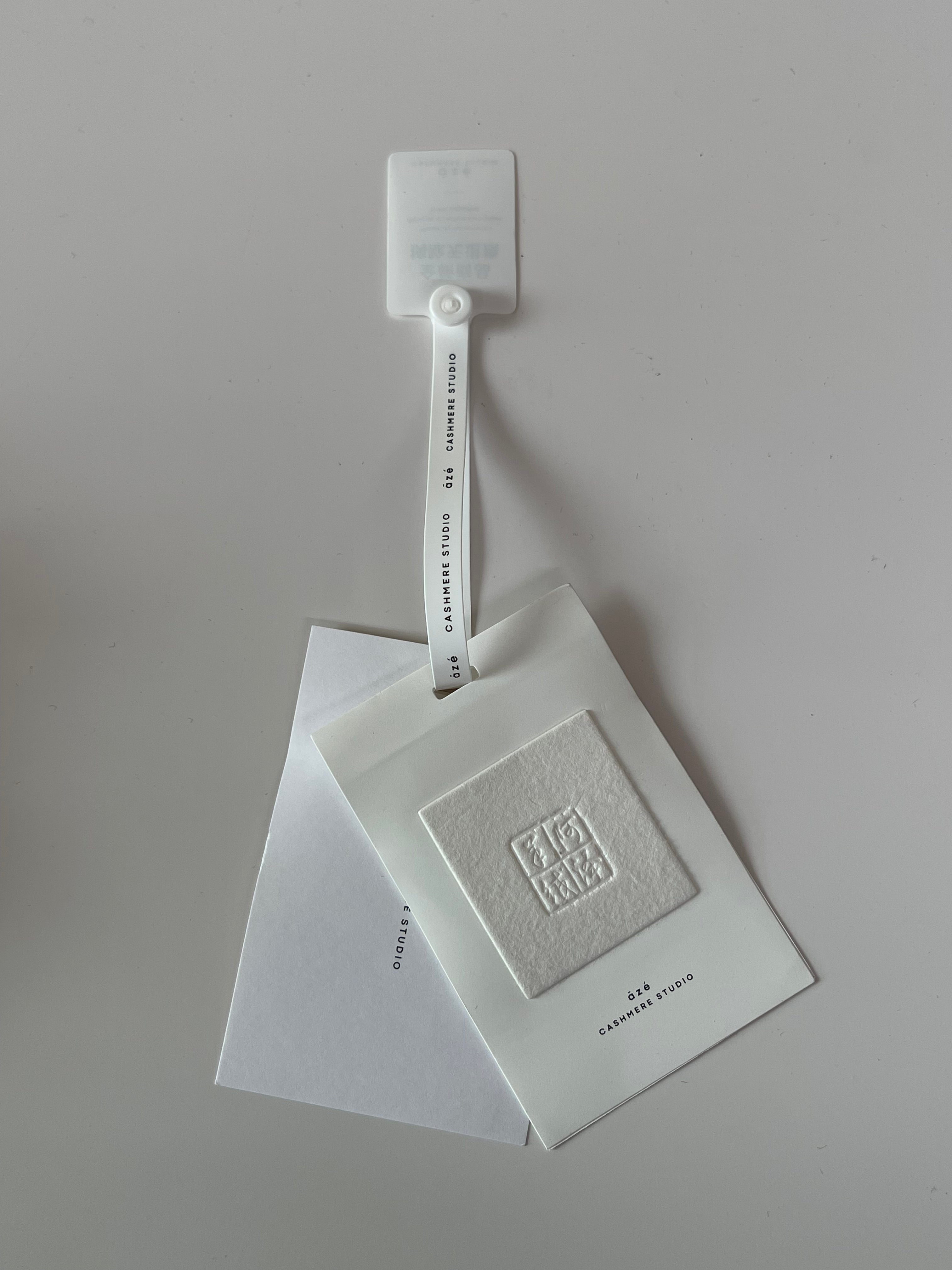 Dape Custom Clothing Hang Tags with Embossed Logo
