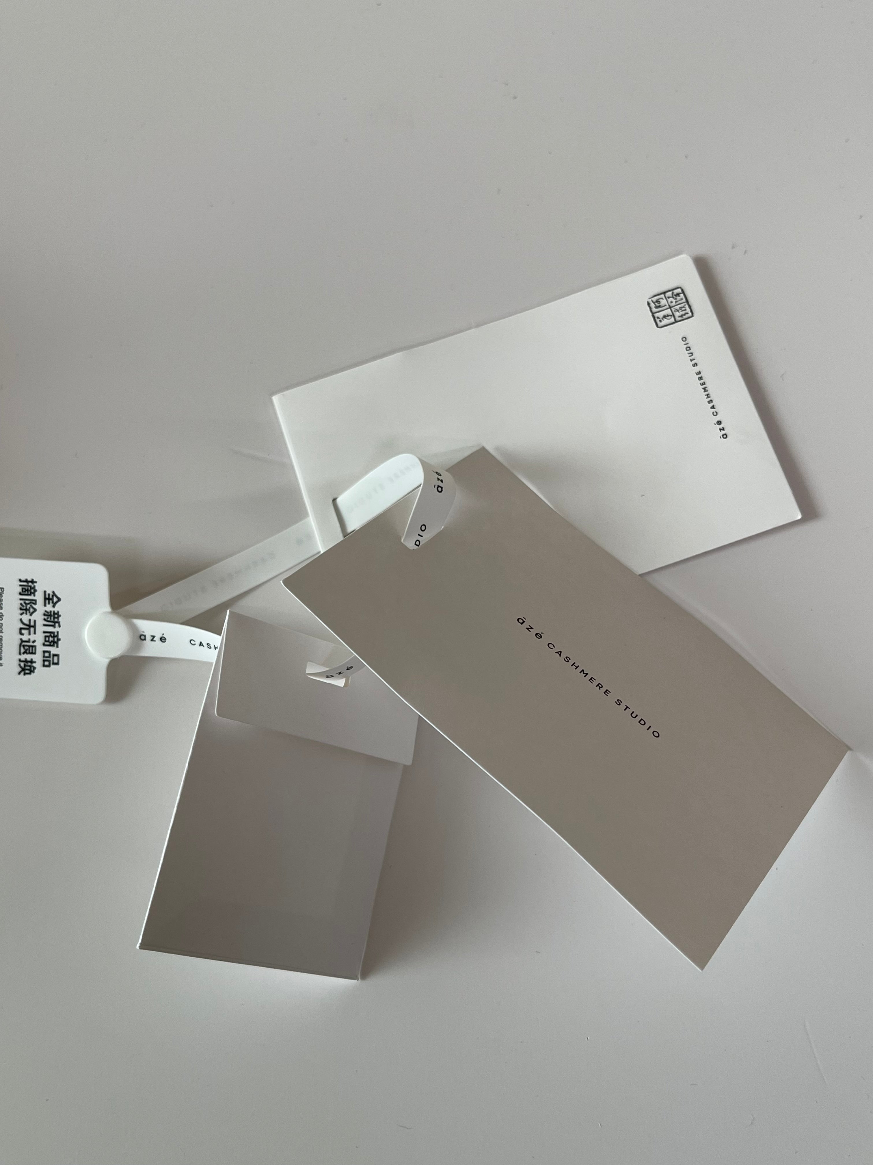 Dape Custom Clothing Hang Tags with Embossed Logo